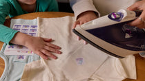 Choisir entre des étiquettes thermocollantes et des étiquettes à coudre pour vêtements d'enfants